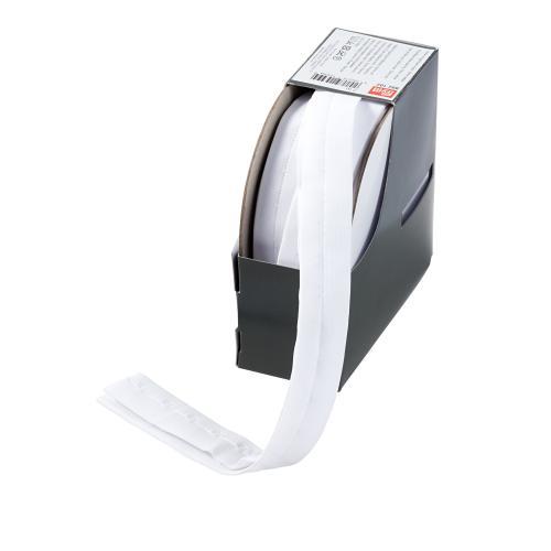 Hakasnauha valkoinen ja musta, väli 19mm, rullassa 7m, Prym