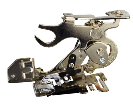 Laskostuslaite singer